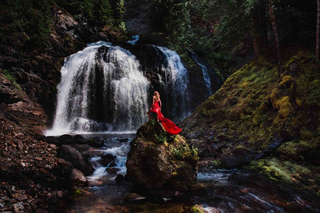 A woman in Moul falls, an incredible Wells Gray waterfall 