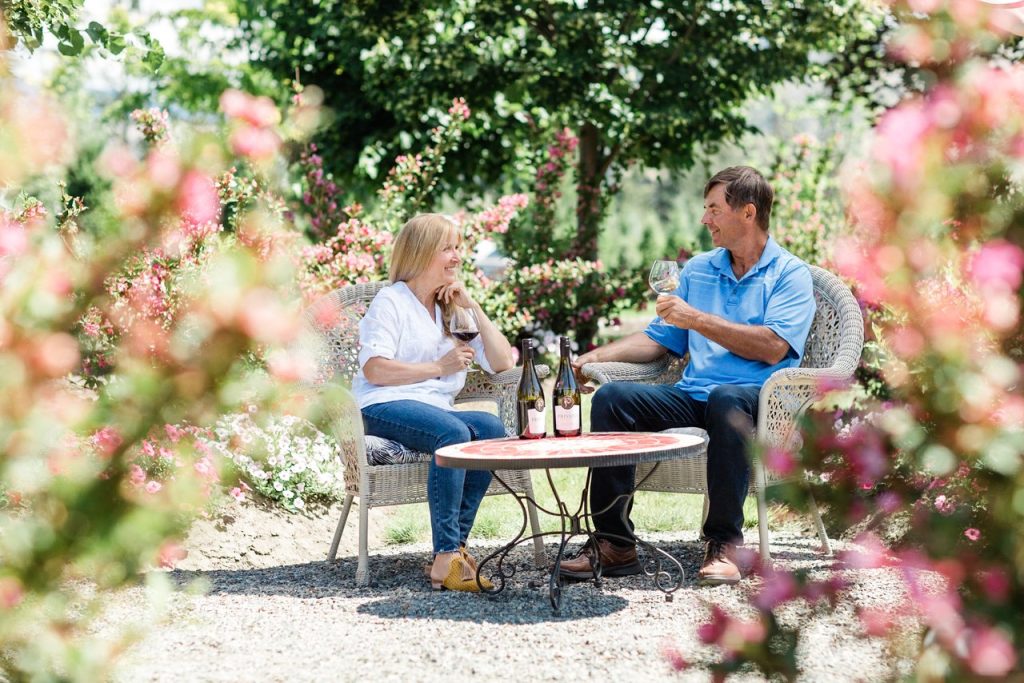 Couple enjoying a cup of wine in a winery of BC